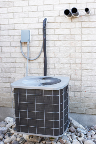 Air conditioning unit on building exterior